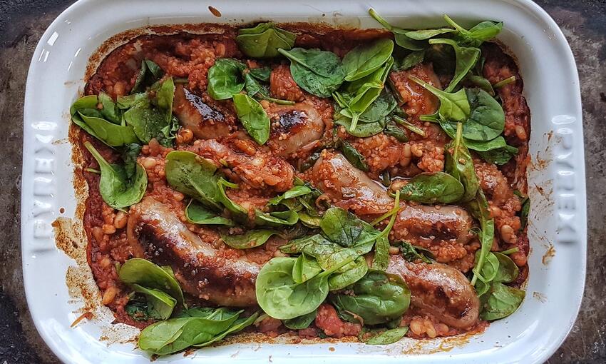 pork, apple & fennel sausage, bean, tomato and spinach tray baked