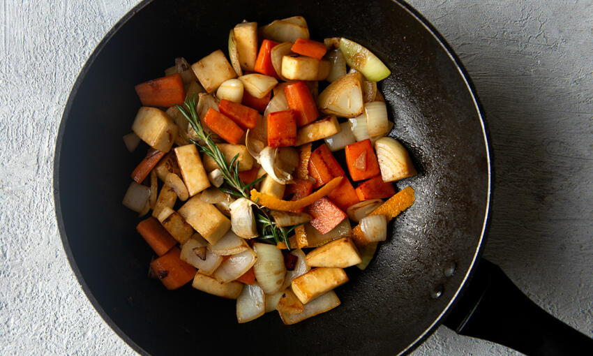 sauted vegetables in a pan 