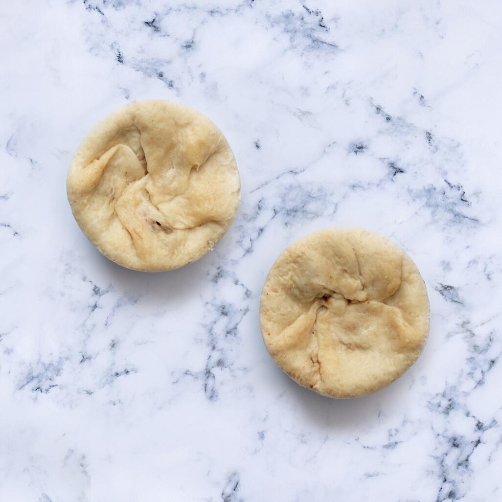 Steak & Kidney Suet Pudding on marble background