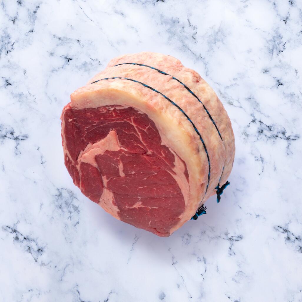 rolled fore rib of beef on marble