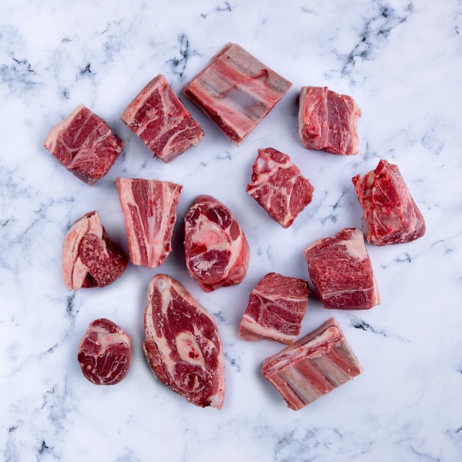 diced mutton on the bone on marble background