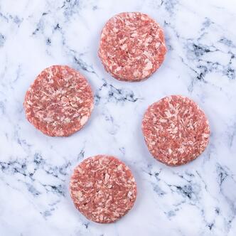 pork burger patty on marble background