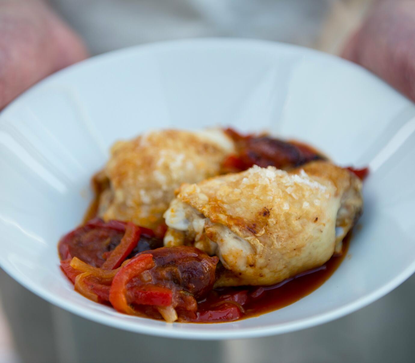 Juicy chicken thighs, developing in the subtle spices of chorizo & juices of pepper stew makes this 