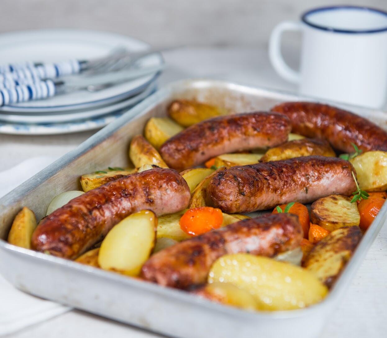 The flavoursome combination of thick Nidderdale sausages with fresh seasonal veg, baked altogether u