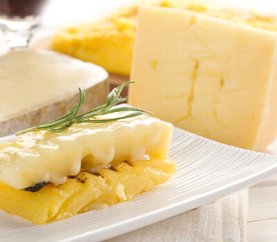 Polenta and Parmesan Gratin Recipe Online. Classic Summery and Indulgent Dessert Pairing the Flavour
