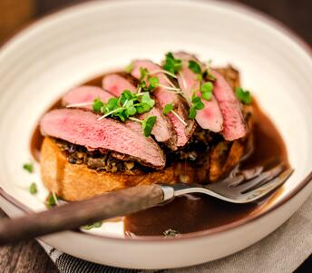 cooked grouse breasts on toast