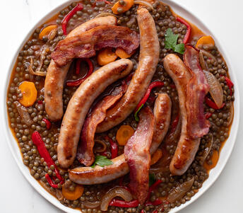 sausages, puy lentils and sweet peppers cooked