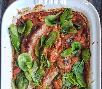 pork, apple & fennel sausage, bean, tomato and spinach tray baked